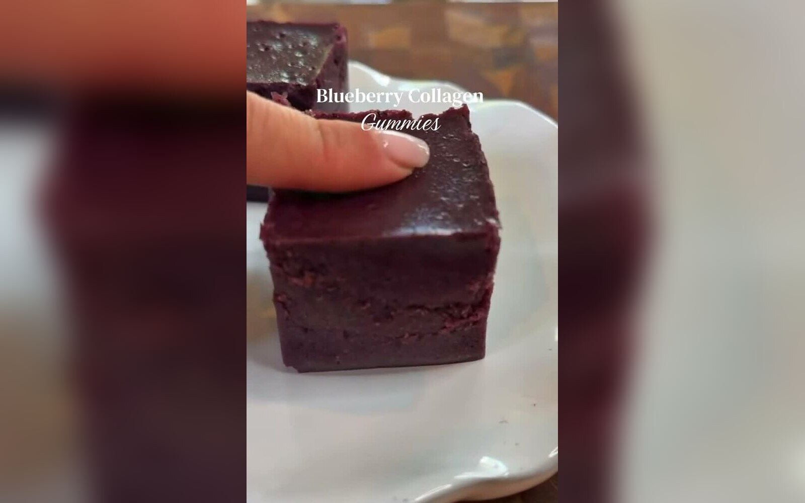 Blueberry collagen gummies on a white plate